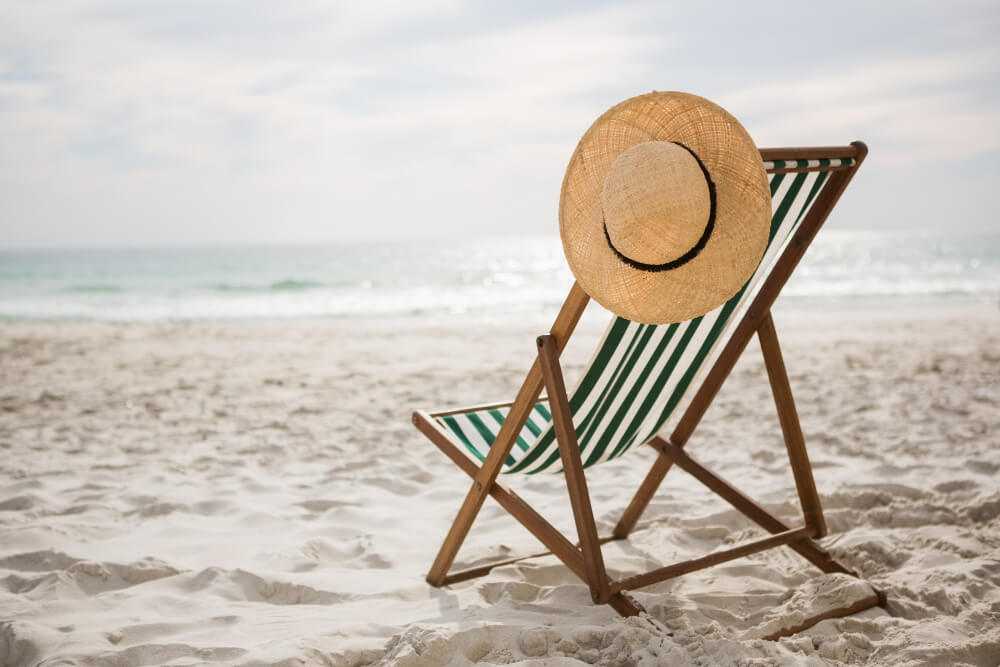 straw-hat-kept-empty-beach-chair(1)